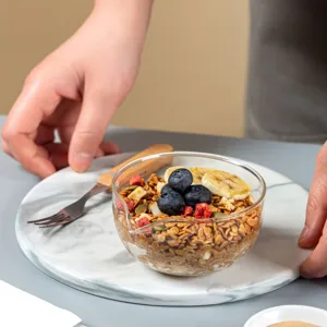 Clear glass bowl with pour spout for desserts, baking prep, and sauces. Heat resistant design.