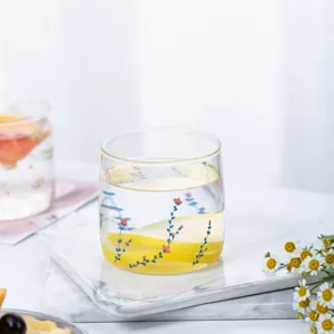 Clear glass cup with floral pattern, heat-resistant drinkware for morning milk, juice or yogurt.