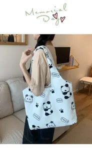 Cute cartoon panda canvas tote bag, large capacity casual eco-friendly shoulder handbag for women.