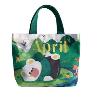 Korean style mini canvas tote bag for women, cute cartoon print commuting lunch handbag.