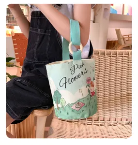 Canvas bucket bag with wooden ring handle and cute bear flower print, perfect for daily commuting.