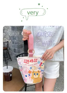 Canvas bucket handbag with cute cartoon animal print and wooden ring handle for women daily.
