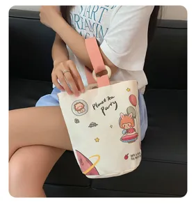 Borsa a secchiello in tela con simpatici cartoni animati per donna, grande e rosa.