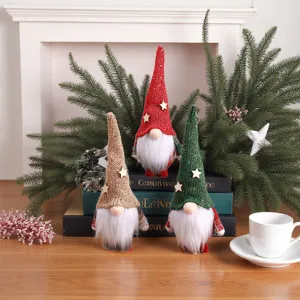 Detailed view of cute Christmas gnome plush dolls with knitted hats for holiday decor.