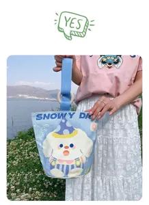 Casual canvas bucket bag for women, cute cartoon dog print handbag, stylish daily commuter tote.