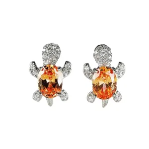 Pendientes de tuerca de tortuga de moda con piedras ovaladas naranjas y detalles pavé.