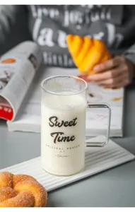 Clear glass mug with handle and custom letter print, perfect for cold drinks, beer, and office use.