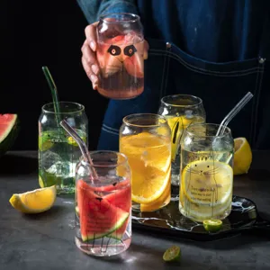 Creative transparent glass cola can cups with straws and fruit lifestyle main display.