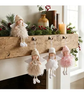 Detailed view of cute Christmas angel plush hanging ornaments with soft feather skirts and hats.