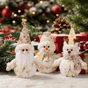 Nordic plush Christmas ornaments detail shot featuring cute Santa snowman and reindeer with gold details.