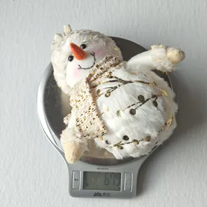 Nordic plush glowing snowman Christmas ornament holiday desktop decoration product detail view.
