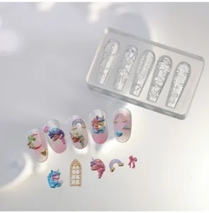 Molde de silicona transparente para unas con disenios 3D de unicornio y arcoiris para nail art.