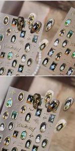 Close-up of retro gold frame ghost Halloween nail art stickers on almond nails.
