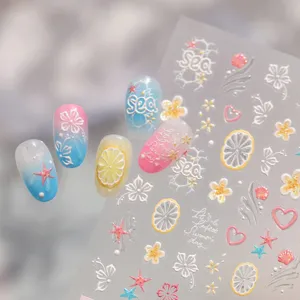 Adesivi per unghie stile spiaggia estiva con limoni, stelle marine e fiori colorati.