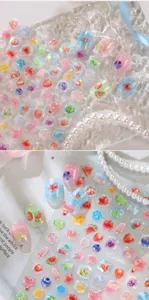 Nahaufnahme von transparenten Jelly-Frucht-Nagelstickern mit Wassermelonen- und Erdbeerdesign