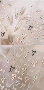 Detailansicht von 3D-Schleifen-Nagelstickern mit eleganten Punkten und weißen Spitzenmustern