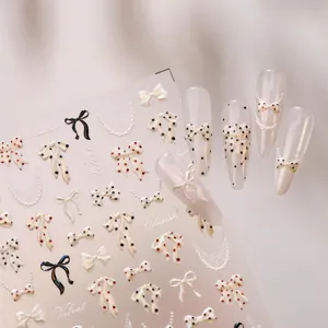 Elegante 3D-Schleifen-Nagelsticker mit Spitze und Punktmuster für französische Ballett-Nägel.