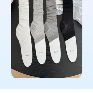 Detail view of summer thin ballet style stirrup slouch socks, half-foot leg warmers for women.
