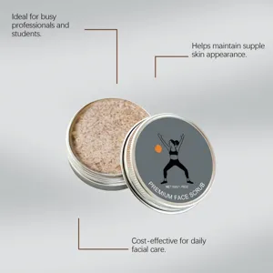 Detailed close-up of facial scrub inside a metal jar highlighting texture and lid design.