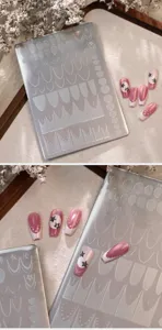 Detailed view of the TG-071 stainless steel nail stamping plate with star and moon designs.
