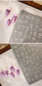 Close-up of TG-057 nail stamping plate featuring various bow and ribbon designs.