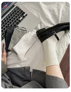 Women autumn solid color ribbed mid tube cotton socks, versatile long stack socks for daily wear.