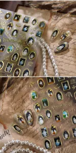 Detailed view of Halloween ghost nail stickers in vintage gold frame designs