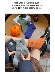 Halloween cute embroidered mid-tube cotton socks featuring ghost and skull details for cozy wear.