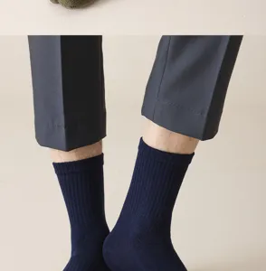 Close-up detail of men's dark blue ribbed toe socks, comfortable pure cotton fabric.
