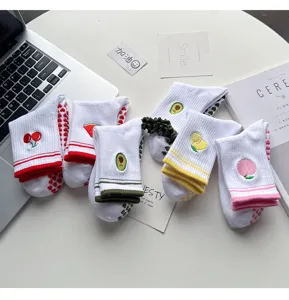 Cute fruit embroidery non-slip yoga socks for women, breathable cotton mid-tube pilates socks.