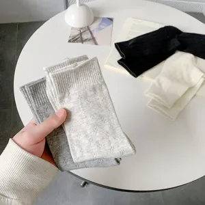 Detailed view of women's mesh mid-tube socks, thin breathable cotton socks in various chic colors.
