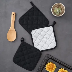 Kitchen pot holders heat resistant cloth pads quilted baking mats with hanging loops set.