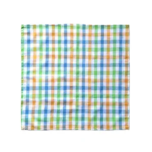 Detailed view of the multi-color checkered tea towel, vibrant plaid fabric pattern design.