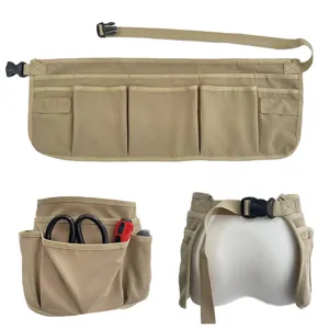 Details of the multi-pocket utility tool apron, featuring durable fabric and adjustable waist.