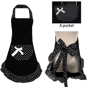 Black white polka dot kitchen apron cute princess style with bow detail and pocket.