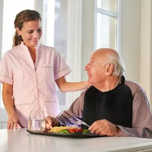 Waterproof black adult bib for elderly and disabled, comfortable clothing protector for dining.