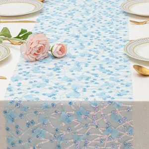 Centro tavola con farfalle 3D blu dettaglio paillettes delicate per decorazione.