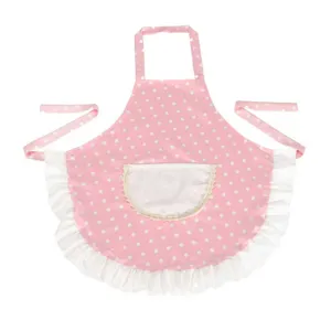 Cute pink polka dot kitchen apron with white ruffle hem and front pocket for cooking cleaning