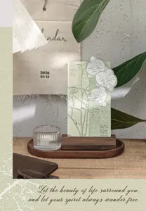 Artistic embossed orchid bookmark on a wooden base for vintage DIY journaling