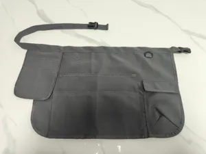Grembiule da lavoro grigio con tasche multiple marsupio porta attrezzi vista dettaglio fibbia.