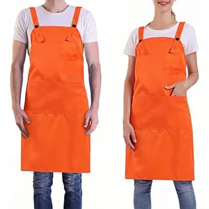 Adjustable polyester work apron with pockets, perfect for restaurant waiters and cooking use.