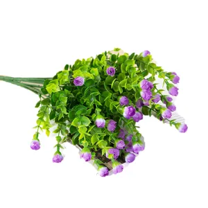 Artificial eucalyptus bouquet with purple rose buds, plastic plant for home decor and floral arrangement.