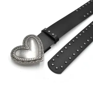 Black PU leather belt featuring a large silver heart buckle and metallic rivet studs.