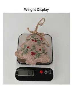 Macro view of detailed weight measurement for burlap Christmas tree hanging ornament