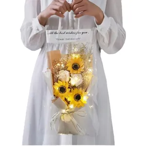 Sunflower soap rose bouquet in transparent tote bag with LED lights and greeting text