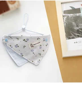 Cute floral pet bib for small dogs, triangle scarf with hanging cord and handmade tag.