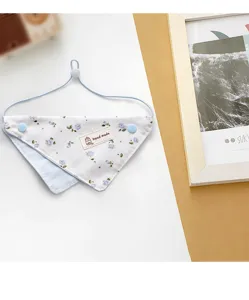 Cute floral pet bandana for small dogs, soft fabric puppy bib with adjustable strap detail.