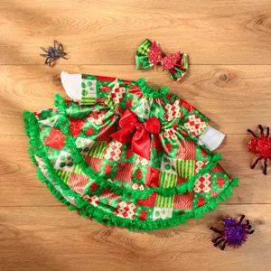Christmas porch goose outfit set with red green dress and bow for holiday decor detail