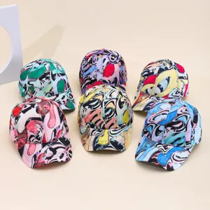 Detailed view of colorful graffiti tie-dye baseball caps, trendy streetwear sun protection hats.