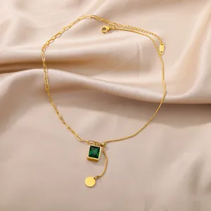 Gold asymmetric green crystal pendant necklace, stylish paperclip and bead chain design.